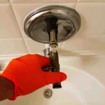 Replacing a Moen single handle positemp cartridge.