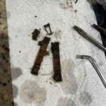 Removing a clothes pin from a disposal