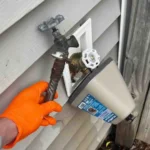 Removal of old hose bib with ruted and leaking galvanized nipple.