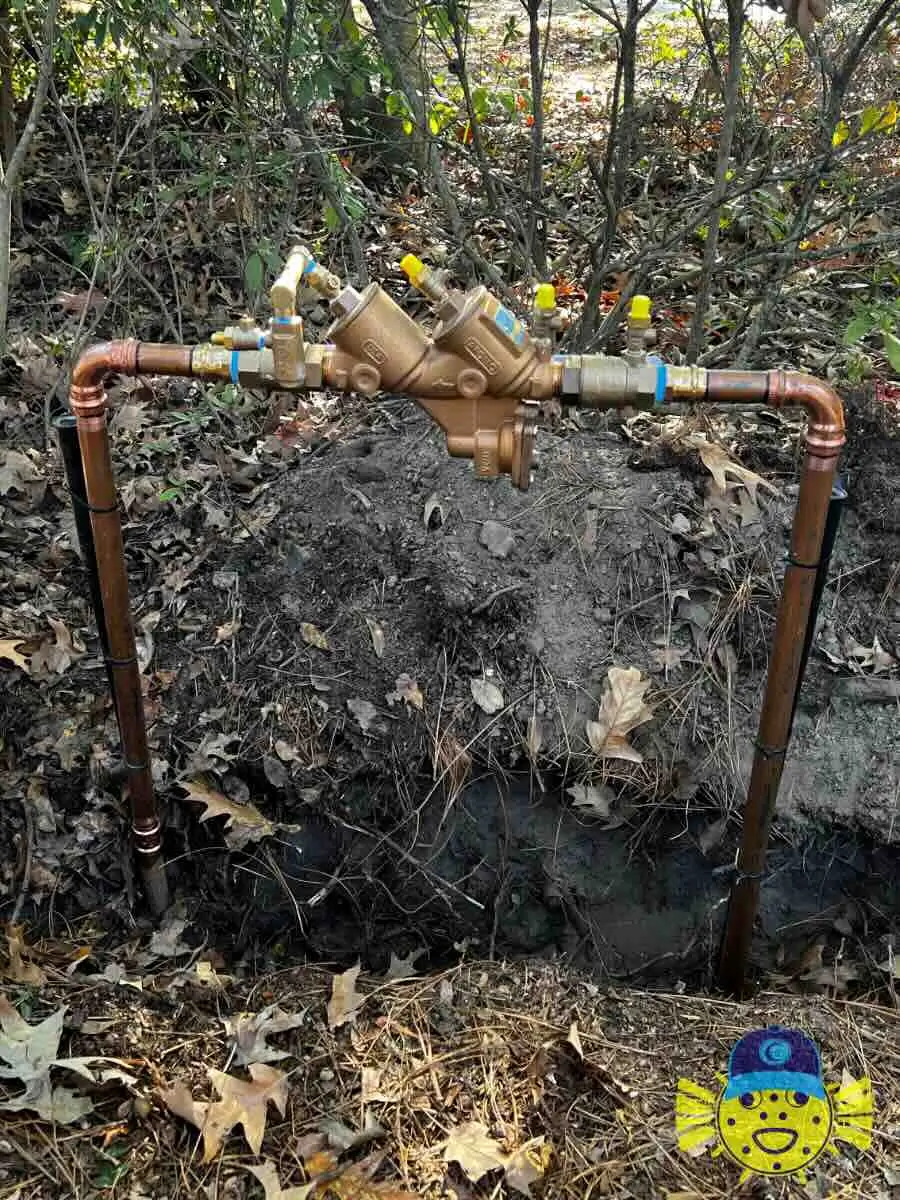 Newly installed backflow preventer assembly with copper piping in Goose Creek, SC by Swell Guy Plumbing.