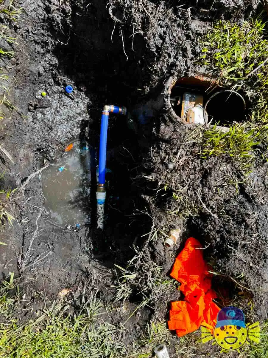 Underground blue PEX water pipe repair connected near a water meter box in Ladson, SC by Swell Guy Plumbing.