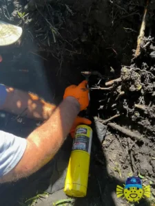 Swell Guy Plumbing technician soldering an underground water pipe repair in Goose Creek, SC