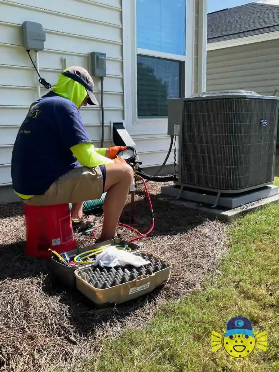 Swell Guy Plumbing technician performing a backflow preventer test next to a home in Summerville, SC.