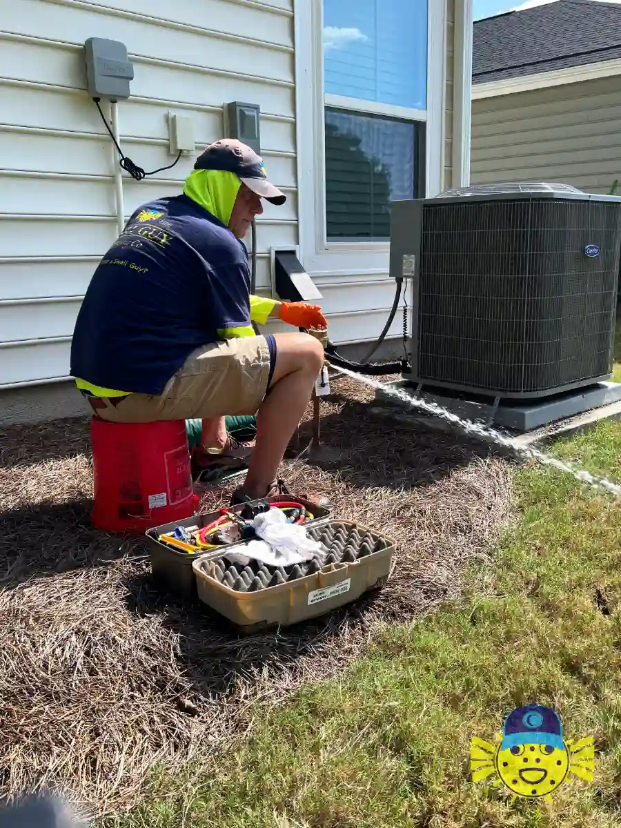 Steven Dyson from Swell Guy Plumbing performing backflow assembly testing outside a home in Summerville, SC.